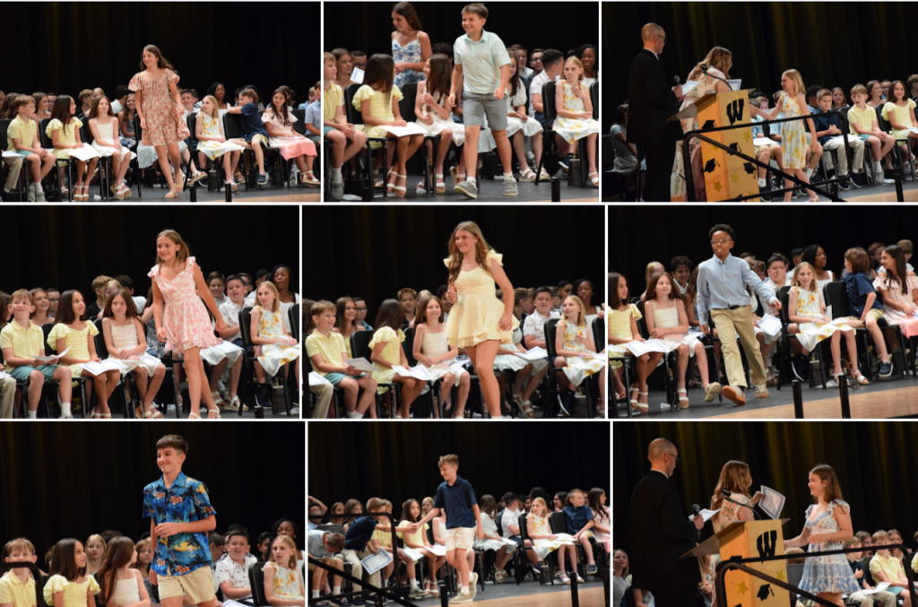 students receiving awards on stage